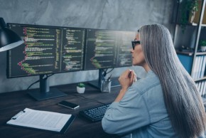 Woman working computer code